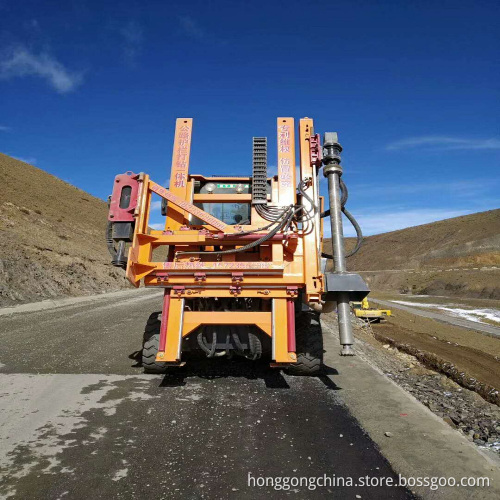 Highway guardrail piling machine